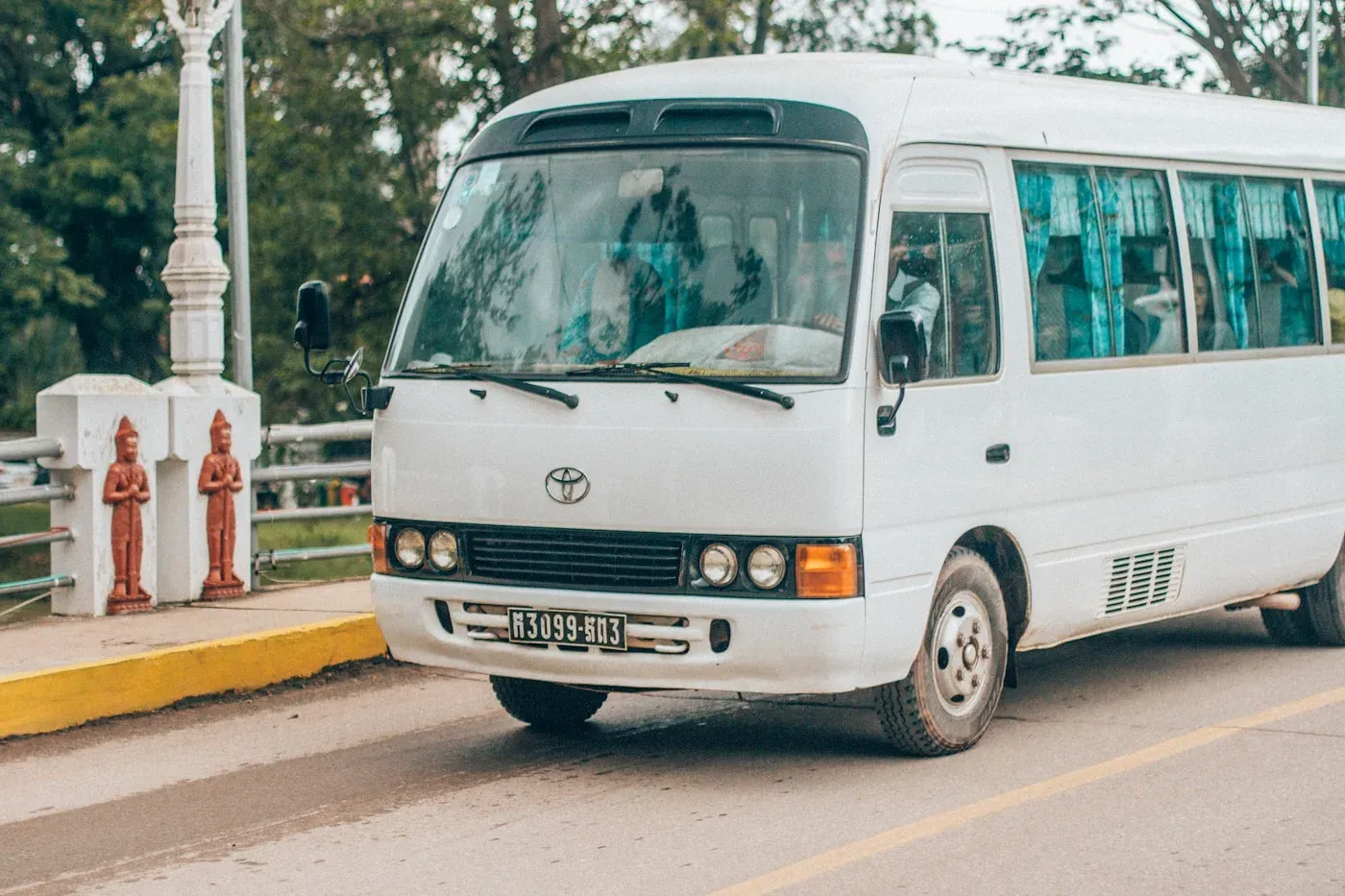 White Toyota passenger minibus