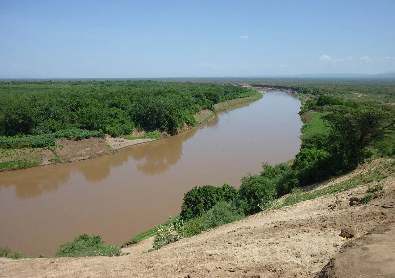 The Omo River winding through a green valley in southern Ethiopia